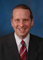 Adam C Smedstad
