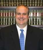 Mr. Dean James Papadakis