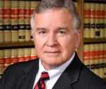 Mr. James E. Mahar, Jr.