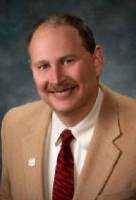 Mr. Thomas E. Lubnau II