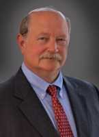 Mr. Larry R. Veselka