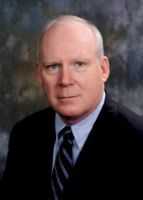 Mr. Charles Cass Simpson III