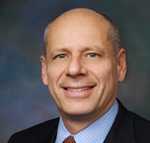 Mr. John J Klusaritz