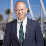 Aaron D Lyons