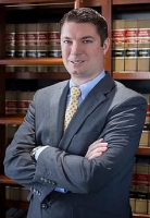 Adam J. Breeden