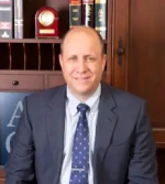 Adam G. Linett