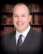 Adam L. Muslusky