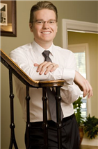Adam K Yowell
