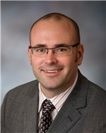 Alan C Perkins