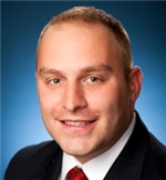 Alan M Root