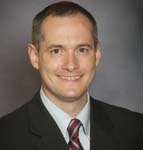 Andrew K Carruthers