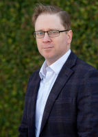 Mr. Andrew J. McCluggage