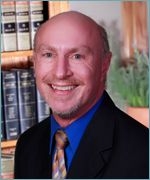 Mr. Brent A. Singer