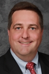 Mr. Brett Thomas Cooke