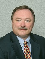 Mr. Bruce A. Campbell
