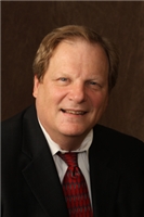 Mr. Bruce A. Stockard