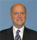 Mr. Bruce R. Lesser