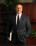 Mr. C. Randall Loewen, (L.L.C.)