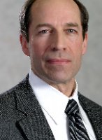 Charles M Seykora