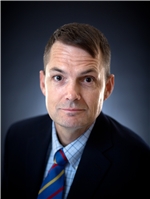 Christopher A. Holland