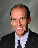 Mr. Christopher E. Howard