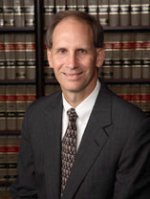 Mr. Christopher E. Howe