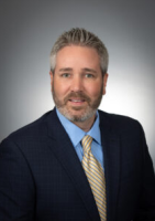 Mr. Christopher A. Lotz