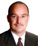 Mr. Christopher M. Curran