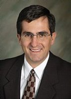 Mr. Christopher T. Roach