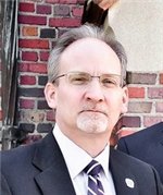 Mr. Colin B. Amann