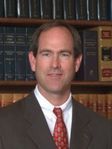 Denis J McCarthy