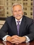 Dennis J. Kusturiss
