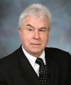 Mr. Dennis J. Whittlesey
