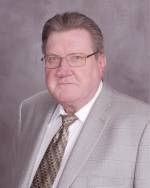 Dennis L Comstock