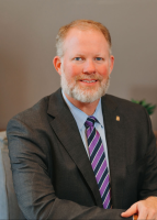 E. Logan Butler IV