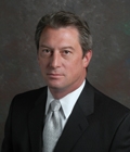 Eric J Flessland