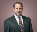 Mr. Geoffrey Justin Henley