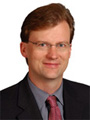 Greg M. Johnson