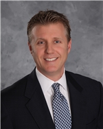Mr. J. Brett Harrison