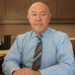 James A. Alfred Caporrino