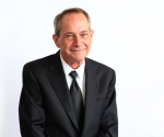 James E. Macholl