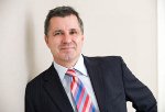 Mr. Jeffrey E. Oleynik