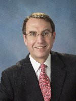 John B Brescher
