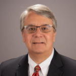 John G. Shubat