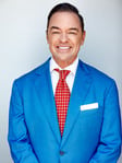 John H Gomez