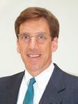 John P. Simpson