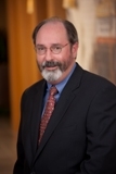 John R Dacey