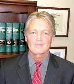 Joseph J Huggins