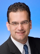 Joshua E. Menard