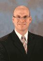 Mr. Justin D. Robertson